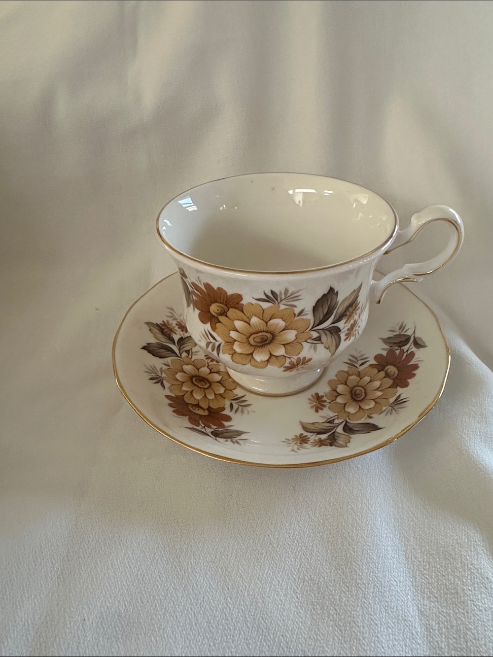 Classic Floral Porcelain Teacup and Saucer in Brown and Gold